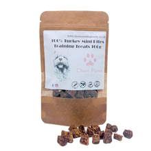 Load image into Gallery viewer, Package of Chow Paws 100% Turkey Mini Bites Training Treats with treats displayed in front.