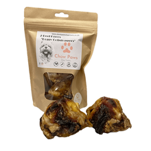 Load image into Gallery viewer, Packaged dog treats with 'Chow Paws' branding on a white background