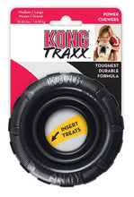 Load image into Gallery viewer, KONG Traxx dog toy packaging with a black tire-shaped toy and white ball, featuring text about durability and target weight.