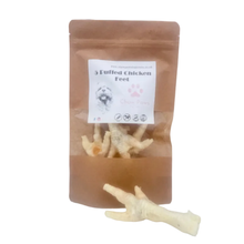 Load image into Gallery viewer, Package of puffed chicken feet with a visible chicken foot on a white background