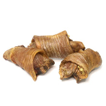 Load image into Gallery viewer, Three natural dog chew treats made of wrapped jerky and fat, displayed on a clean white background.