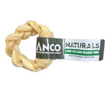 Load image into Gallery viewer, Anco Naturals Lamb Collagen Braided Ring dog chew toy with its original paper band packaging, shown on a plain white background.