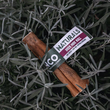 Load image into Gallery viewer, Deer hide roll with a label on green leaves