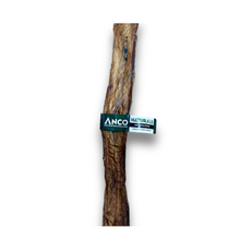 Load image into Gallery viewer, A natural brown Anco Naturals Giant Buffalo Biltong with a dark green and white 'ANCO NATURALS' label wrapped around the middle, isolated on a white background.