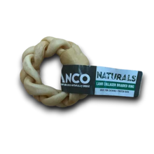 Load image into Gallery viewer, A natural cowhide braided ring dog chew with a black and green paper label that reads 'ANCO NATURALS LAMB COLLAGEN BRAIDED RING'.