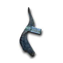 Load image into Gallery viewer, A natural horn chew for dogs, featuring a dark gray to black textured horn with a paper band label that reads 'ANCO NATURALS'.
