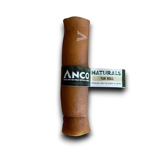 Load image into Gallery viewer, Anco Naturals Yak Roll tobacco product shown as a rolled cigar-like pack with a black and white paper band around the center, isolated on a black background.