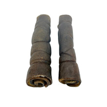 Load image into Gallery viewer, Two rusted metal cylindrical objects on a white background
