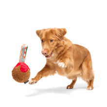 Load image into Gallery viewer, Dog playing with a red and brown toy on a white background