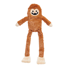 Load image into Gallery viewer, A brown plush toy resembling a fuzzy monster or creature with a stitched smiling face, long limbs, and cream-colored hands and feet, shown against a plain white background.