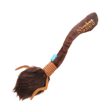 Load image into Gallery viewer, A plush dog toy shaped like a broom, with a brown handle, brown faux-fur bristles, tan wrapped grip details, and gold embroidered text reading 'Nimblus 2000' on the handle. A small blue tag is attached near the handle, all shown on a plain white background.