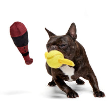 Load image into Gallery viewer, Dog playing with a yellow toy on a white background