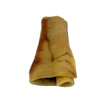 Load image into Gallery viewer, A rolled, golden-brown leather or hide-like strip with darker toasted patches, photographed on a plain white surface.