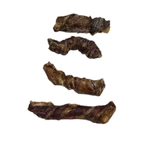 Load image into Gallery viewer, Five pieces of dried meat on a white surface