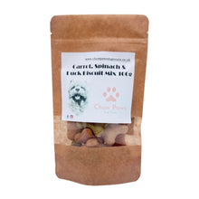 Load image into Gallery viewer, A stand-up kraft paper pouch of Chew Paws Carrot, Spinach & Duck Biscuit Mix 100g, containing dog treats visible through a clear window, on a white background.