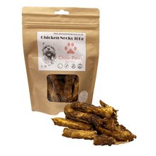 Load image into Gallery viewer, Bag of Chow Paws Chicken Necks dog treats with treats displayed in front on a white background