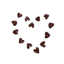 Load image into Gallery viewer, Small heart-shaped Duck Salami Hearts candies on a white surface
