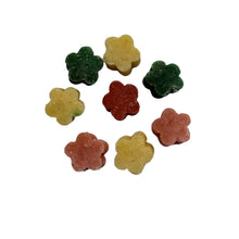 Load image into Gallery viewer, Colorful flower-shaped gummy candies on a white background
