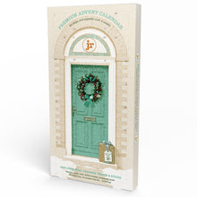 Load image into Gallery viewer, Premium Advent Calendar box featuring an illustration of a teal holiday door with a wreath, on a cream brick-patterned background. The front shows the text 'PREMIUM ADVENT CALENDAR for cats and puppies over 4 weeks' and a small gift bag with a letter.