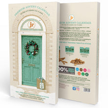 Load image into Gallery viewer, A boxed product package shown from the front and back on a plain white background. The front features a teal holiday door with a wreath and the text 'PREMIUM ADVENT CALENDAR' and '100% PURE MEAT TRAINING TREATS & STICKS.