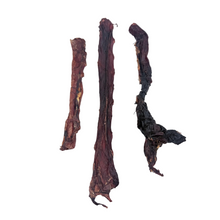 Load image into Gallery viewer, Three dried dog treats on a white background