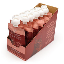 Load image into Gallery viewer, A cardboard display box holding multiple pouches of Purina for Cats Duck Paste wet cat food, photographed on a clean white background.