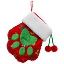Load image into Gallery viewer, Red Christmas stocking with green paw print design on a white background