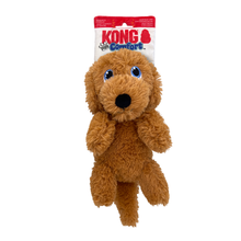Load image into Gallery viewer, A brown plush dog toy with blue eyes and a black nose, attached to a red, white, and blue KONG Comfort retail header card, shown against a plain white background.