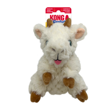 Load image into Gallery viewer, Kong Comfort Sheep plush dog toy with brown horns and hooves, attached to its original red and white cardboard packaging header, shown against a plain white background.