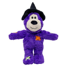 Load image into Gallery viewer, A purple plush dog toy dressed as a witch, featuring a black pointed hat, a white snout, and orange patchwork details on its body and sleeves, set against a plain white background.