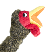 Load image into Gallery viewer, Plush toy resembling a turkey with a red face and yellow beak on a white background