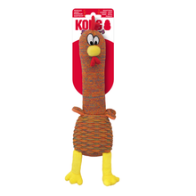 Load image into Gallery viewer, Kong the Turkey dog toy in its original packaging, featuring a knotted orange and brown body, yellow legs, and a red beak and wattle.