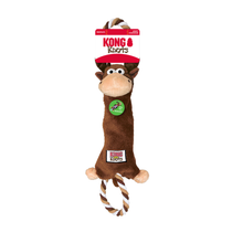 Load image into Gallery viewer, Kong Knobs plush monkey dog toy with a brown body, beige snout and feet, a red and white hat, and a twisted rope tail, shown on a white background with its retail header card visible.