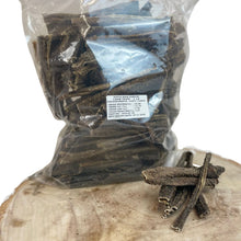 Load image into Gallery viewer, A packaged product of Nova Lamb Tripe, with individual pieces of the tripe visible in front of the package.
