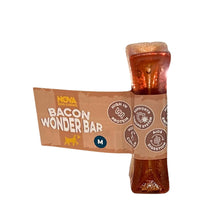 Load image into Gallery viewer, A Nova Dog Chow Bacon Wonder Bar, size M, shown with its brown paper band packaging wrapped around a clear plastic bottle filled with reddish-brown wet dog food, on a plain white background.