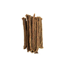 Load image into Gallery viewer, Brown dog treats on a white background