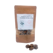 Load image into Gallery viewer, Brown paper bag of salmon and cod training treats with a label on a white background