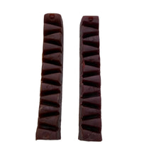 Load image into Gallery viewer, Two Snaps Dog Veggie Treats Smoked Blueberry bars with a ribbed texture on a white surface