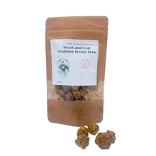 Load image into Gallery viewer, Bag of trout and cod training treats with a label on a white background