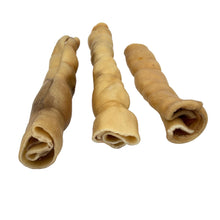Load image into Gallery viewer, Three rolled, twisted pieces of golden-brown chewy dog treats