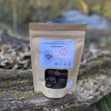 Load image into Gallery viewer, 15 gourmet liver dog sausages pouch with pink chow paws dog treats logo on a tree branch, 3024x4032px