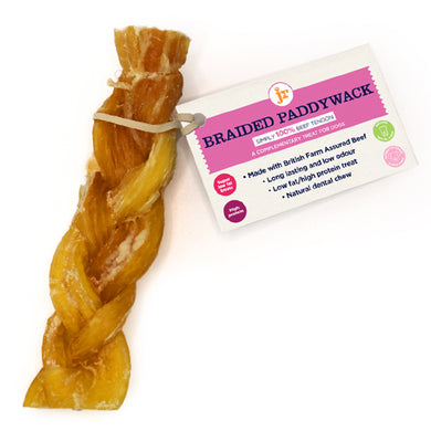 A braided paddywack dog chew treat made of beef, displayed with its packaging which indicates the product is 15cm in length and suitable for puppies.