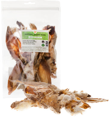 A resealable bag of JR Rabbit Ears With Hair, showing the product as air-dried rabbit ears with visible hair, indicating it is a natural dog chew treat.