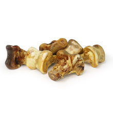 Load image into Gallery viewer, Dog bones of various sizes on a white background

