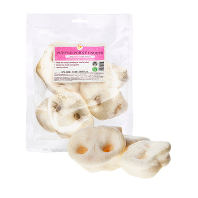A pack of three JR Puffed Porky Snouts for dogs, with one snout visible in the foreground and two in the packaging.