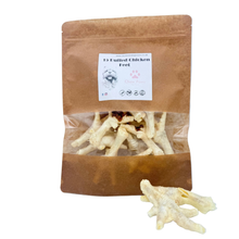 Load image into Gallery viewer, Brown package of puffed chicken feet with a label on a white background

