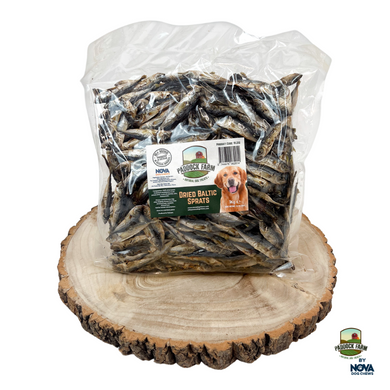 Packaged Baltic Sprats dog treats on a wooden display.
