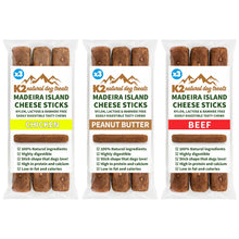Load image into Gallery viewer, Three packages of K2 natural dog treats with different flavors on a white background
