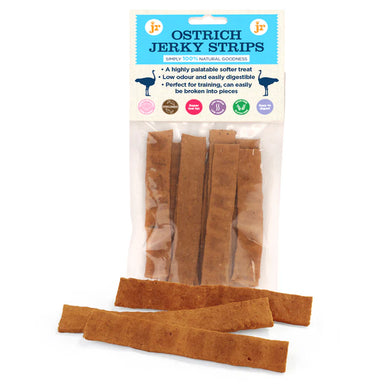 Packaging of JR Ostrich Jerky Strips showing the product name and strips of jerky. The packaging highlights features such as being low fat, hypoallergenic, and suitable for puppies over 12 weeks.