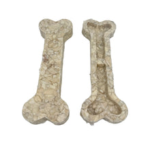 Load image into Gallery viewer, Two bone-shaped pet toys made of natural material on a white background
